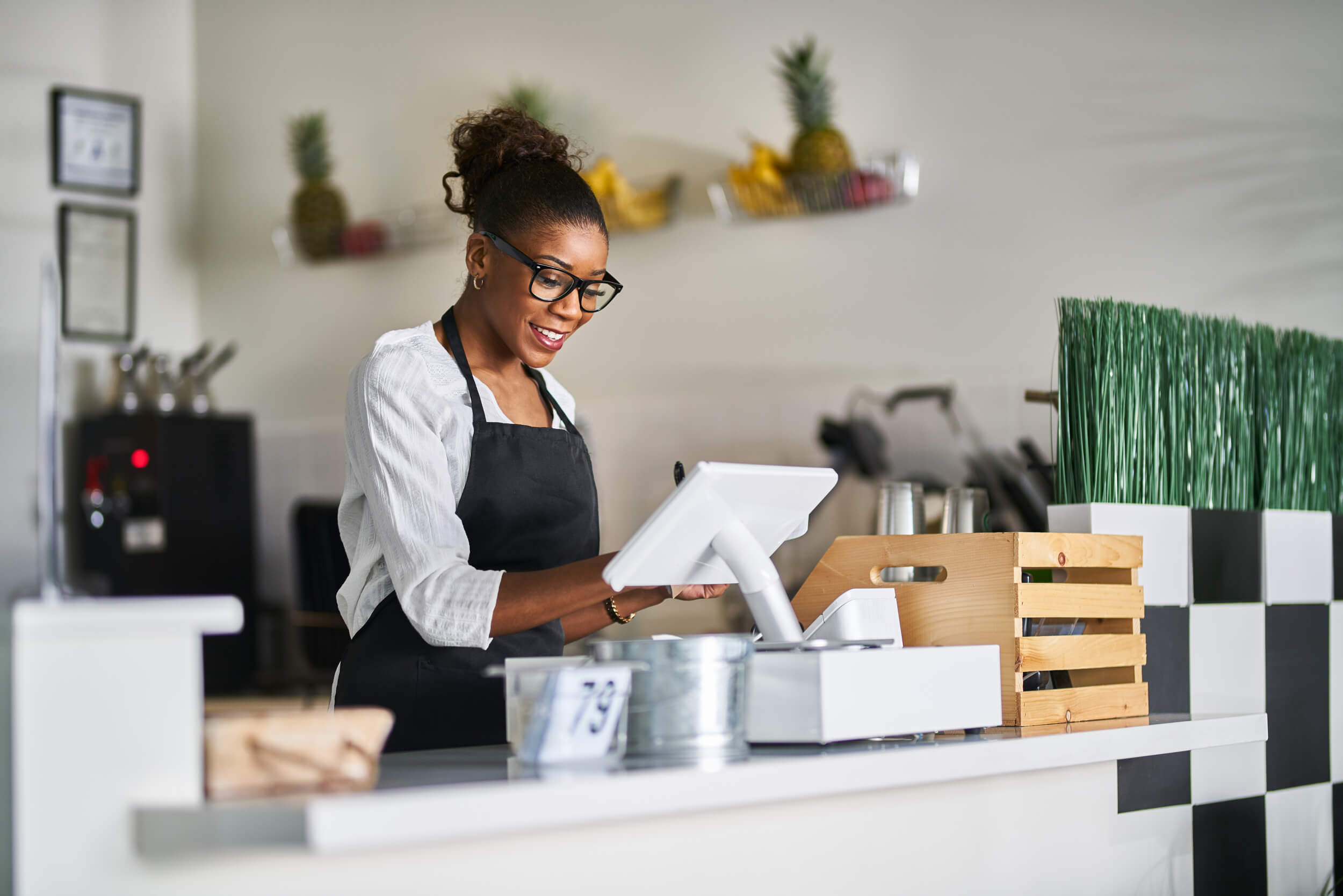 friendly-african-american-shop-assistant-using-pos-2022-06-13-169-07-20-utc